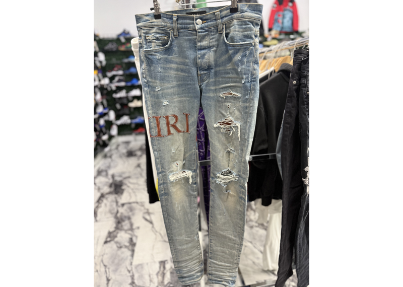 Amiri Orange Logo