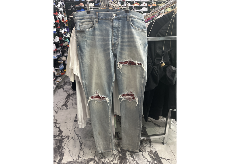 Amiri red bandana jeans
