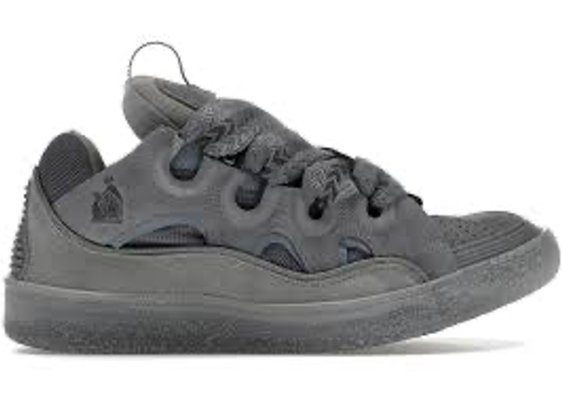 Lanvin Curb sneakers in dark gray, featuring an oversized silhouette and exaggerated woven laces.