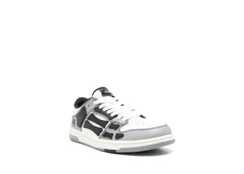 AMIRI Skel Top Low sneakers in a white, black, and grey varsity