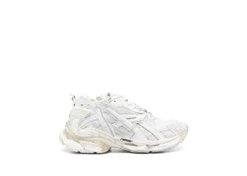 white Balenciaga Runner low-top sneakers feature a layered mesh and polyurethane design.