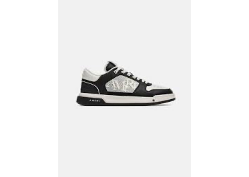 Amiri Classic Low MA Quad Debossed sneakers in black and white, featuring a prominent textured logo on the side.