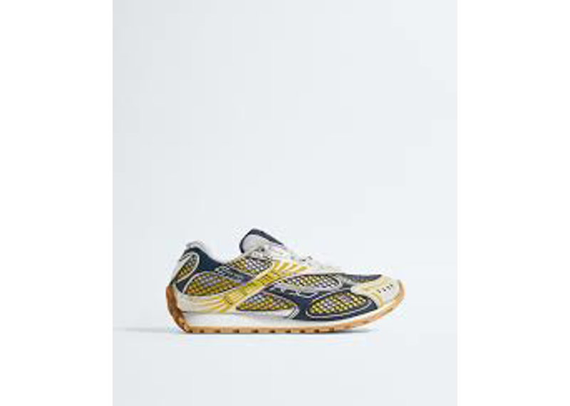 Bottega Veneta Orbit sneakers feature a taxi yellow and denim blue