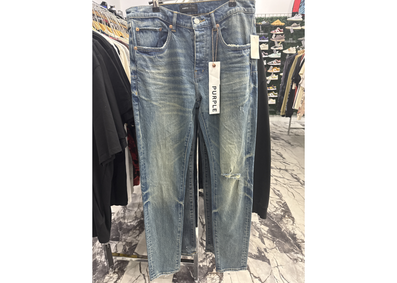Purple jeans blue one leg patch