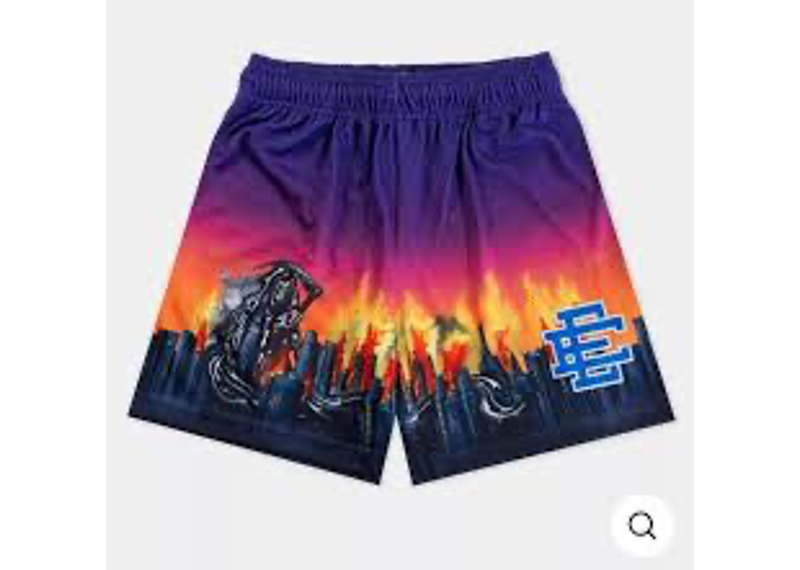 Eric Emanuel x Warren Lotas NYC Reaper shorts feature a vibrant purple and orange fire graphic across the bottom