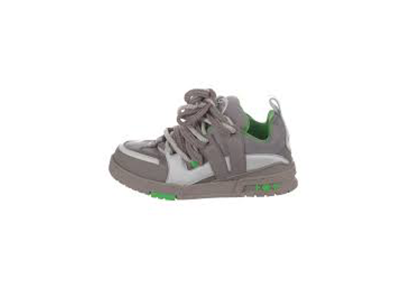 Louis Vuitton LV Skate sneakers feature a distinct grey, white, and neon green colorway with thick, chunky laces