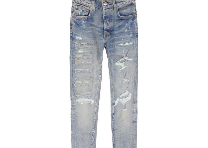 AMIRI Denim Logo Applique Jeans in a light blue/indigo