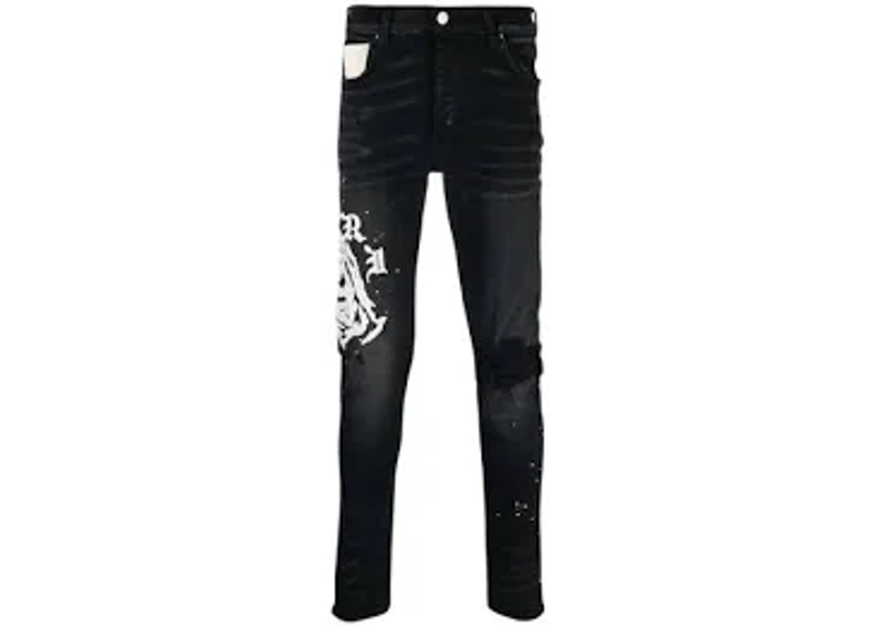 AMIRI black jeans featuring a distressed finish and a prominent white cherub graphic