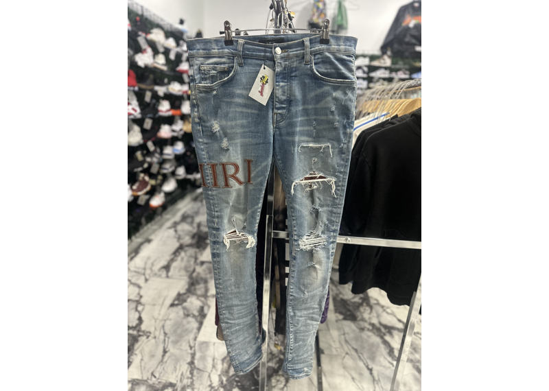Amiri Applique-logo Distressed Jeans - Blue
