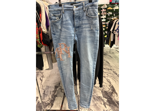 Amiri plaid staggered logo jeans