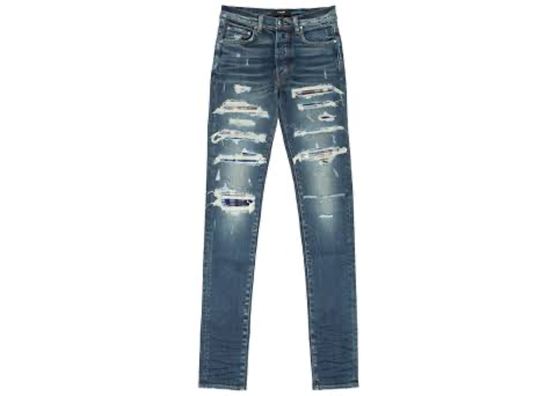 Amiri Blue Plaid MX1 skinny jeans featuring heavy distressing and blue plaid patches.