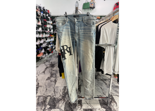 Amiri Black Staggered Logo
