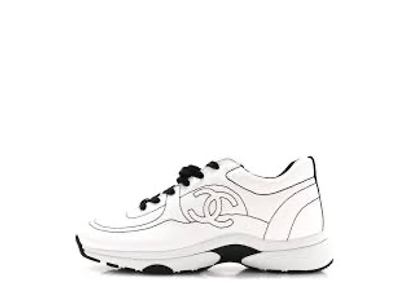white Chanel Cotton CC Sneakers featuring black contrast stitching