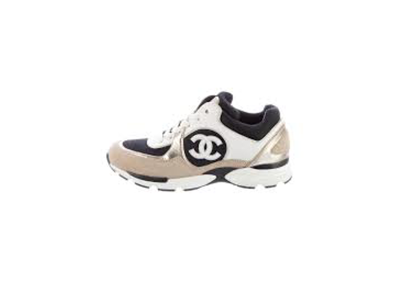 Chanel 22S trainers, featuring a distinct white, beige, and black color